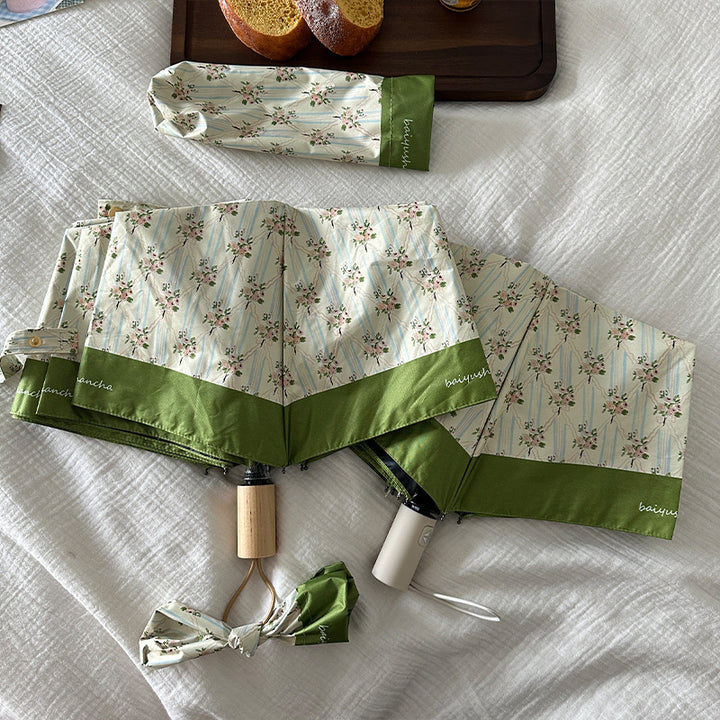 Ladies elegant folding umbrella with floral design Stornfield