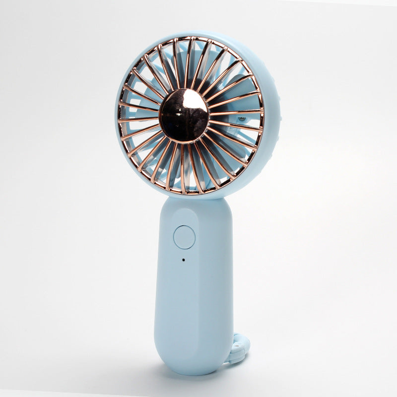 Unisex portable mini hand fan with USB charging and carrying strap Stornfield