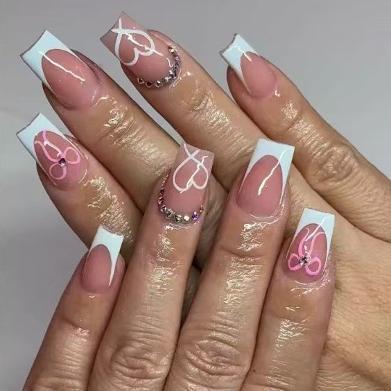 Elegant Nail Art Set with Heart Designs and Rhinestone Details Stornfield
