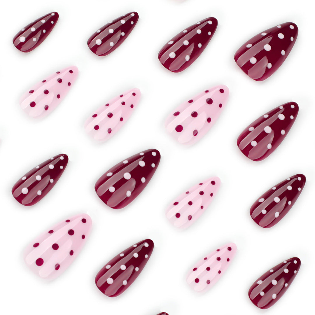 Artful Nail Extensions with Dots and Elegant Accents Stornfield