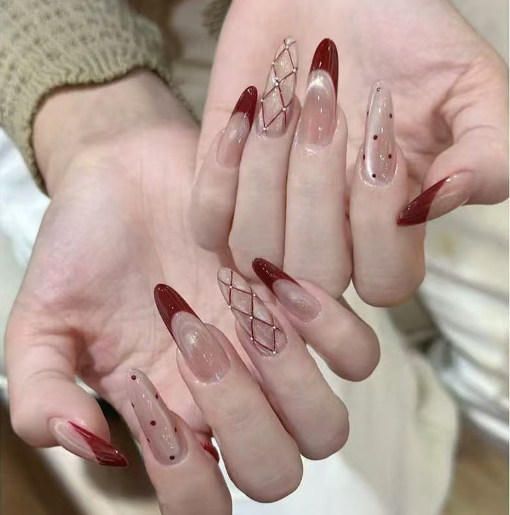 Elegant Stiletto Nail Set with Intricate Designs Stornfield