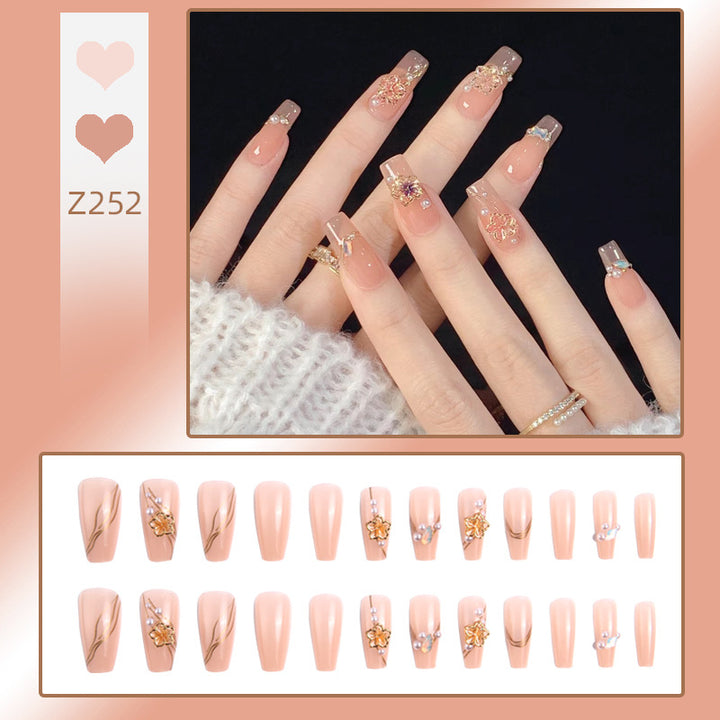 Artificial nail set with elegant floral and luxurious decorations Stornfield