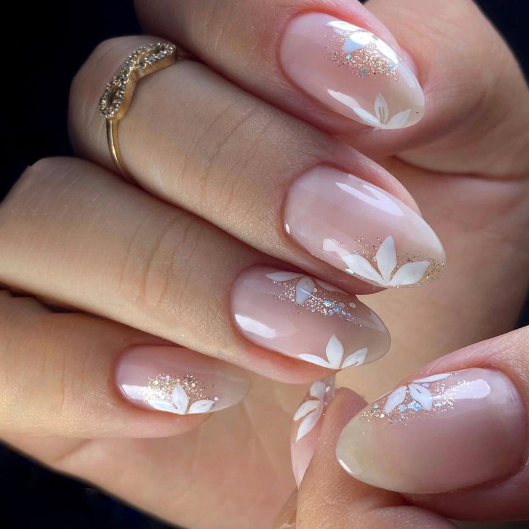 Premium Nail Art with Floral Design and Glitter Accents Stornfield