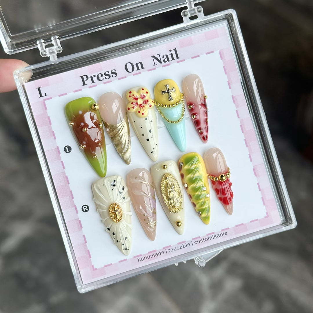 Artistic Press-On Nail Set with Floral and Green Accents