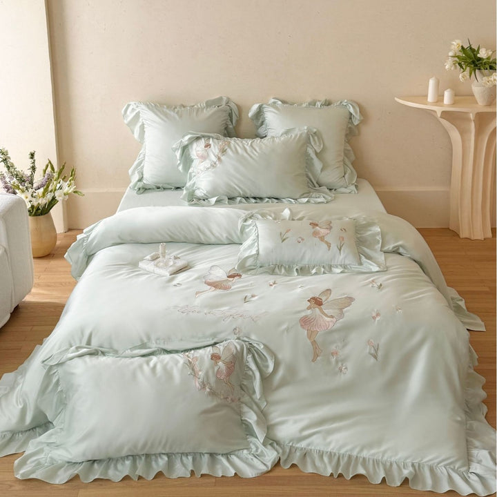 Satin bedding set with embroidery and ruffled hem