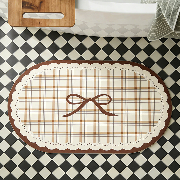 Rectangular table set placemat made of coated cotton mix with check pattern, decorative edge and bow motif