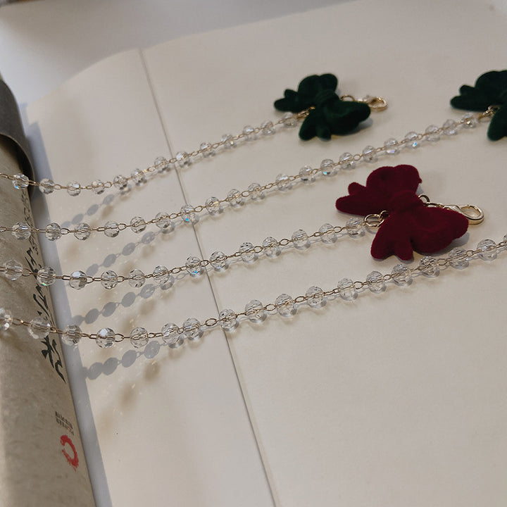 Jewelry holder chain with velvet bow pendant Stornfield