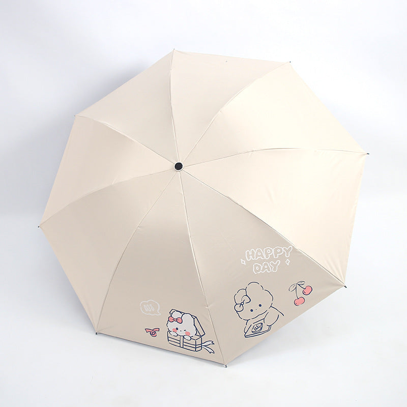 Ladies folding umbrella with playful design and cheerful Stornfield motif