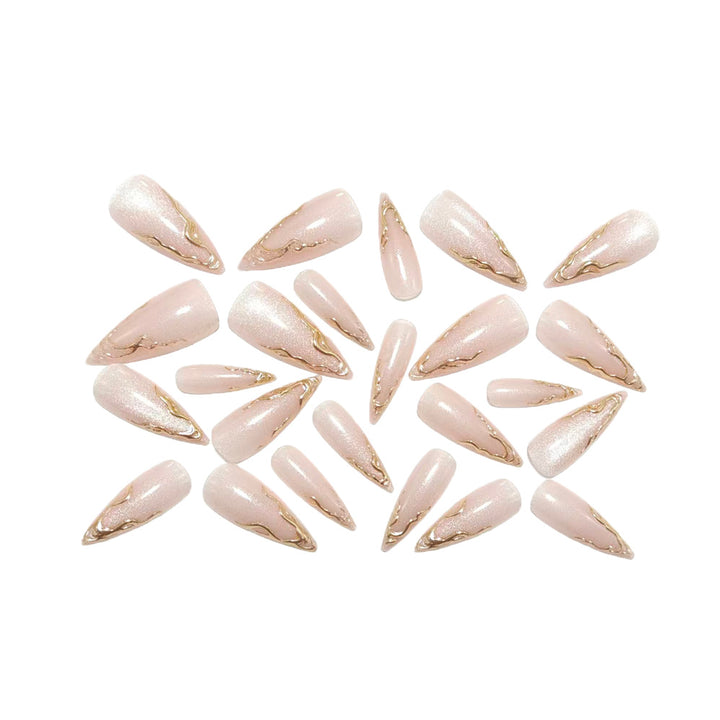 Artificial nails in elegant stiletto design with golden accents Stornfield