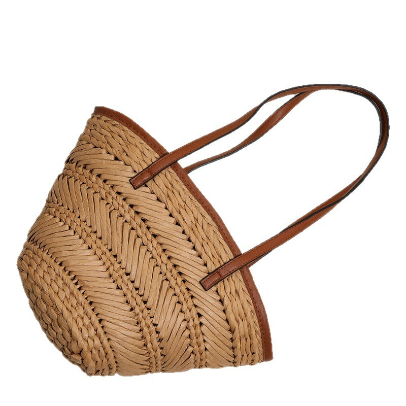 Braided basket bag with innovative leather handles Stornfield