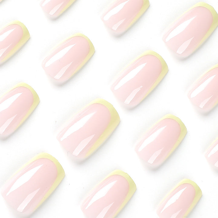 Artistic nail extensions with elegant French tip and modern accents Stornfield