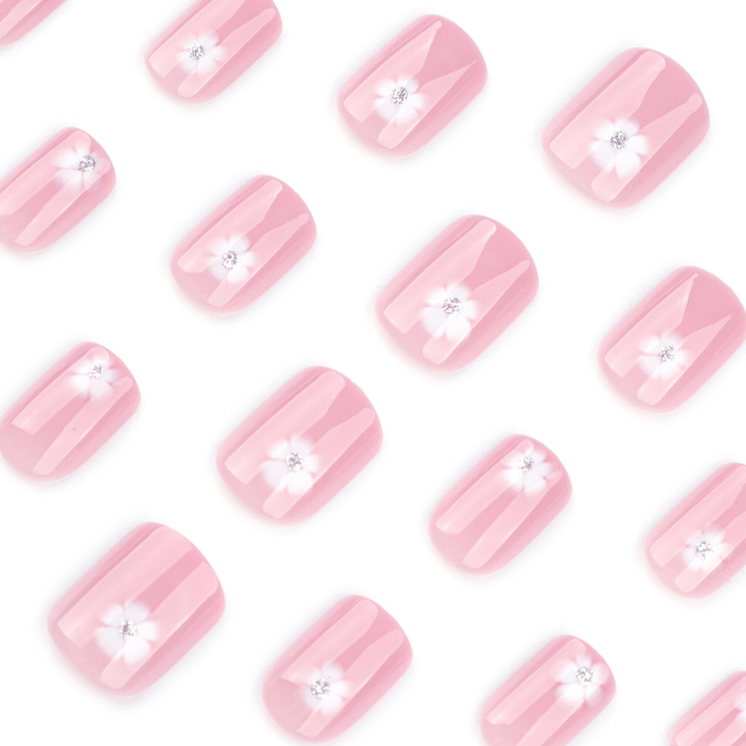 Elegant artificial nails with filigree floral motifs and glitter accents Stornfield