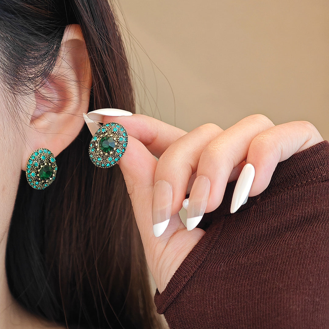Sparkling stud earrings with intricate details Stornfield