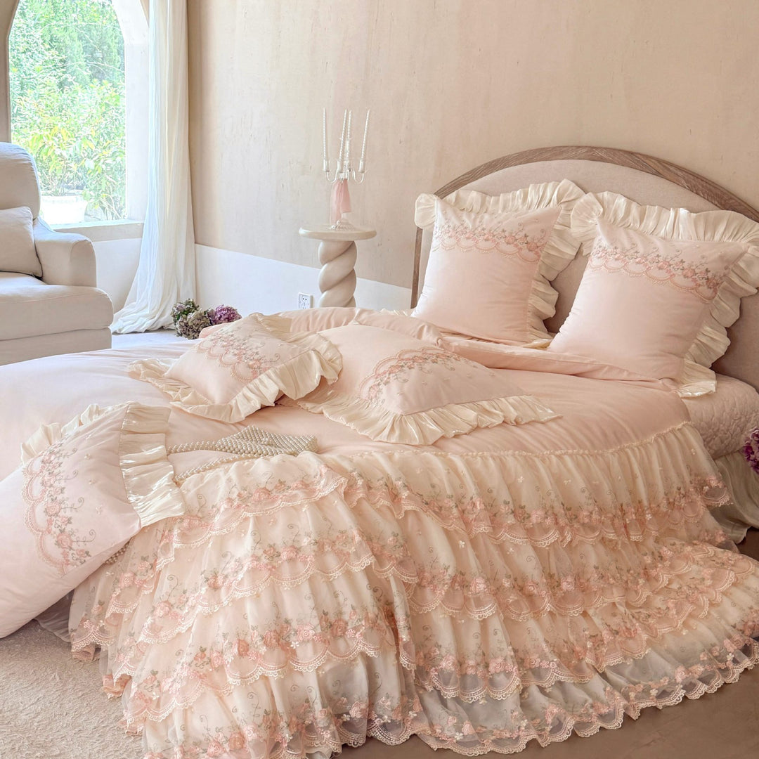 Luxurious Victorian-inspired bedding set with ruffles and embroidery