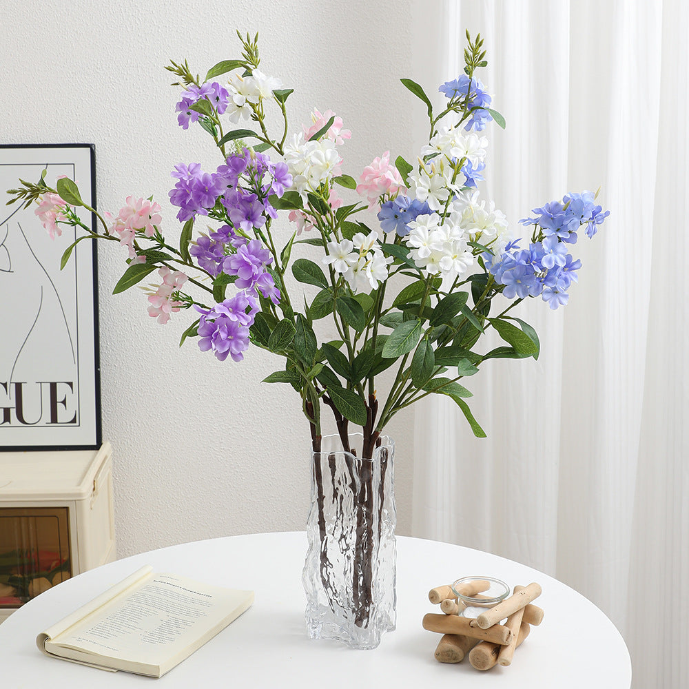 Decorative art branch with white flowers