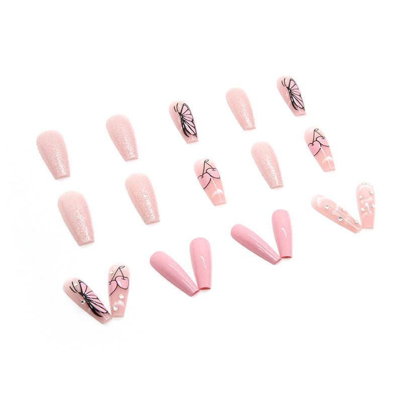Artificial nail set with romantic butterfly designs and glitter accents Stornfield