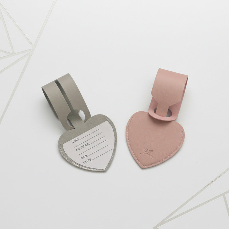 heart-shaped leather luggage tag with adjustable loop Stornfield
