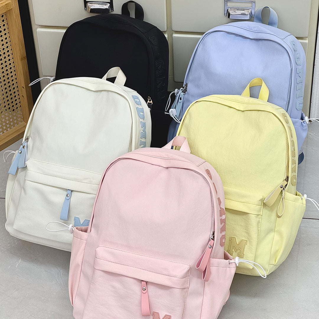 Stylish Canvas Backpack with Plush Keychain Stornfield