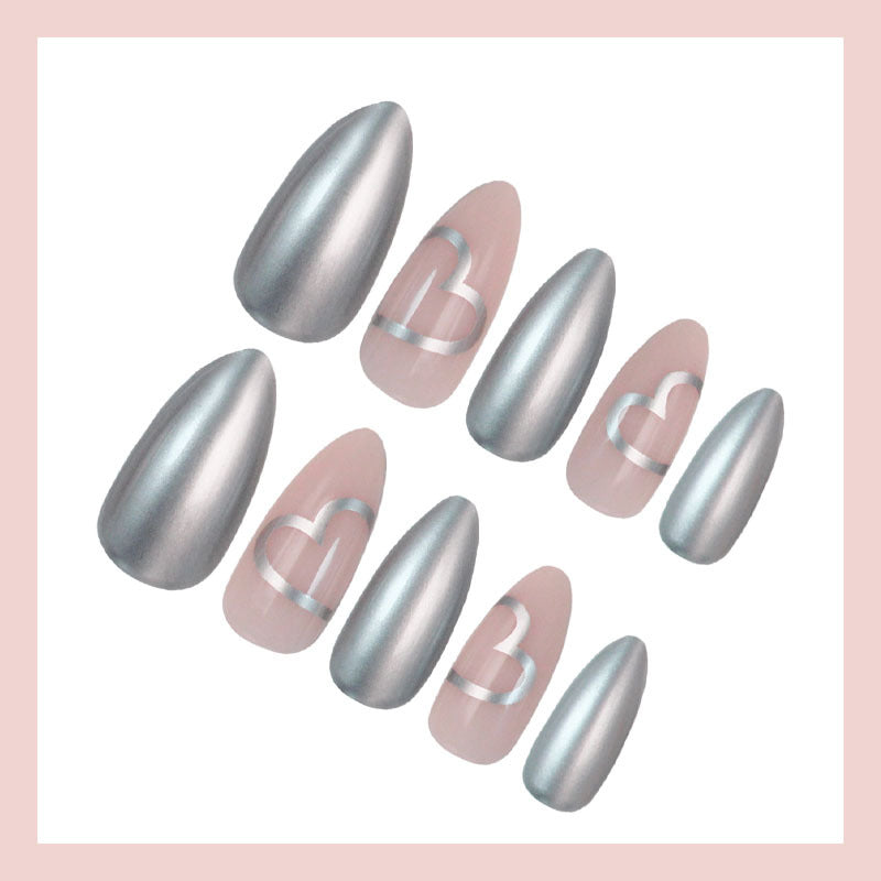 Artificial nail set with luxurious silver finish and heart motifs Stornfield