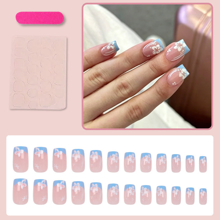 Artificial nail set with delicate flower designs Stornfield