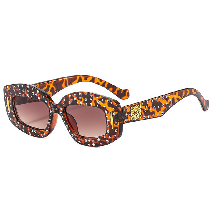 Women striking sunglasses with glamorous rhinestone details Stornfield