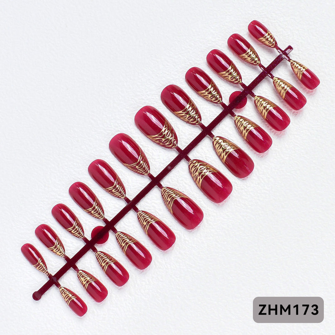 Elegant Press-On Nail Tips with Gold Detailing Stornfield