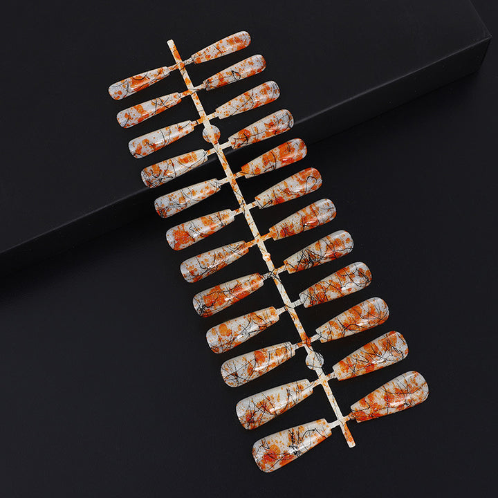 Creative nail art with blood splatter design Stornfield