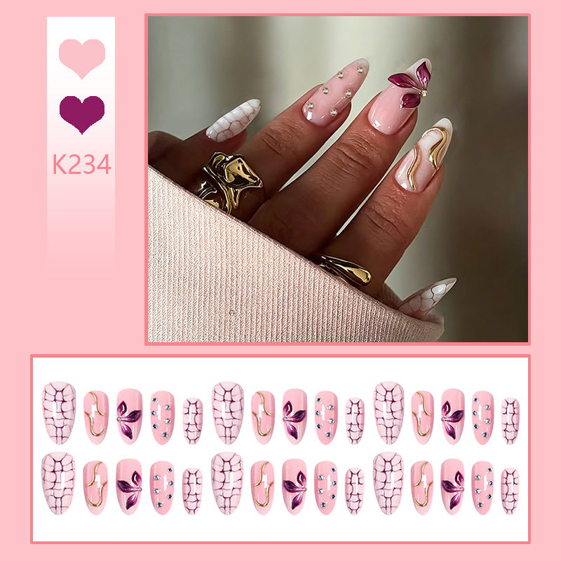 Acrylic nail set with glamorous design and sparkling accents Stornfield