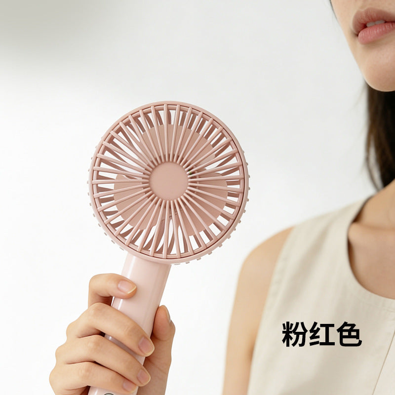 Women's portable handheld fan with ergonomic grip and powerful battery technology Stornfield
