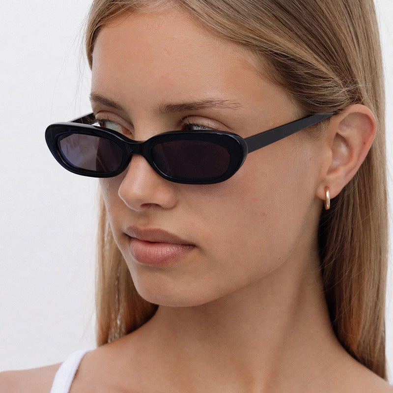 Women's trendy cat-eye sunglasses with transparent plastic frame and UV protection Stornfield