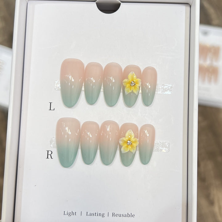 Elegant Ombre Press-On Nail Set with Floral Accents Stornfield