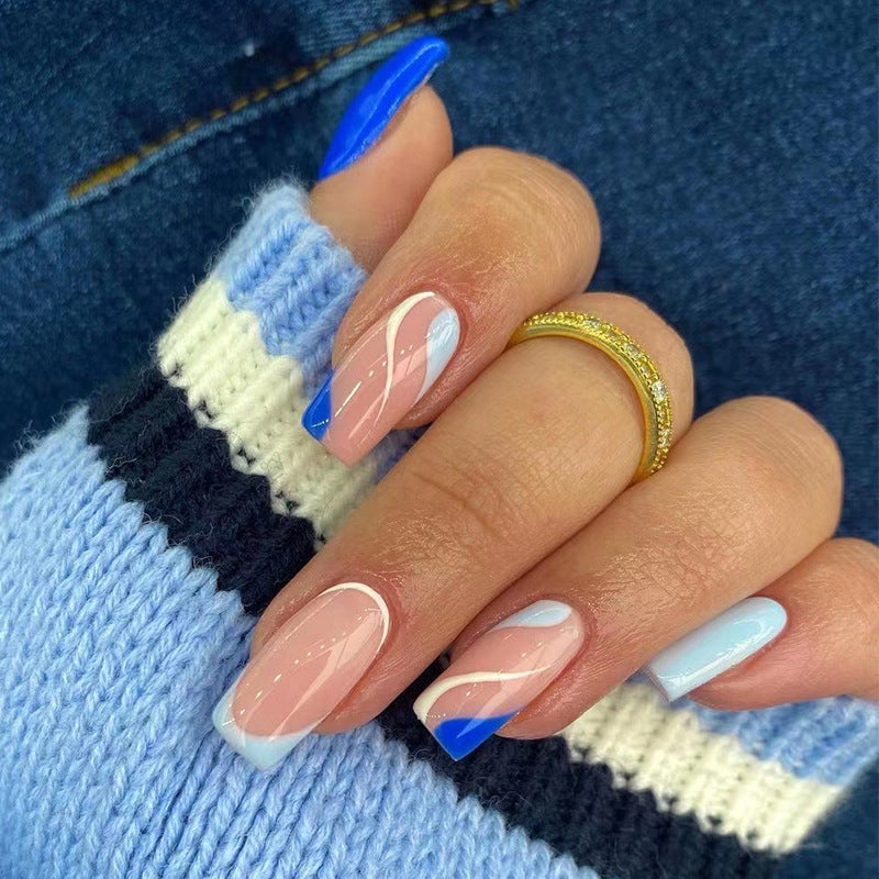 Artful nail extensions with an elegant leaf pattern Stornfield