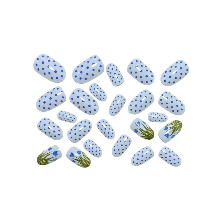 Creative art nails in an elegant polka dot design with floral accents Stornfield