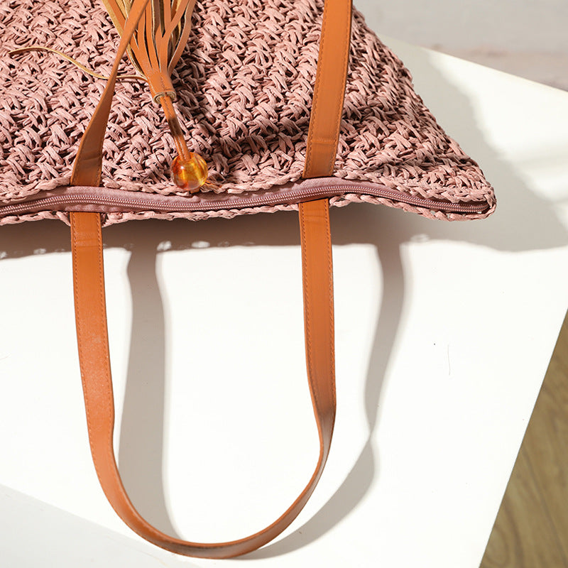 Handcrafted basket bag with fashionable tassel detail Stornfield