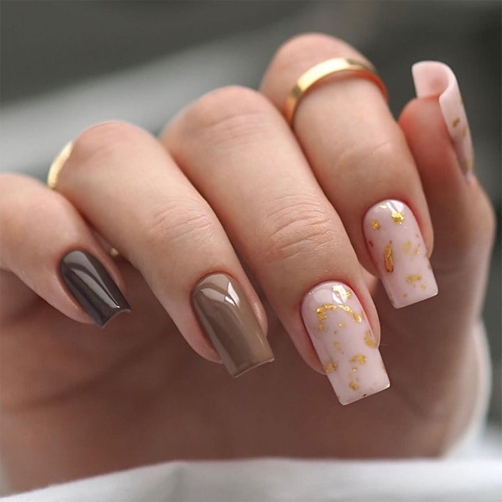 Artful nail extensions with an elegant leaf pattern Stornfield