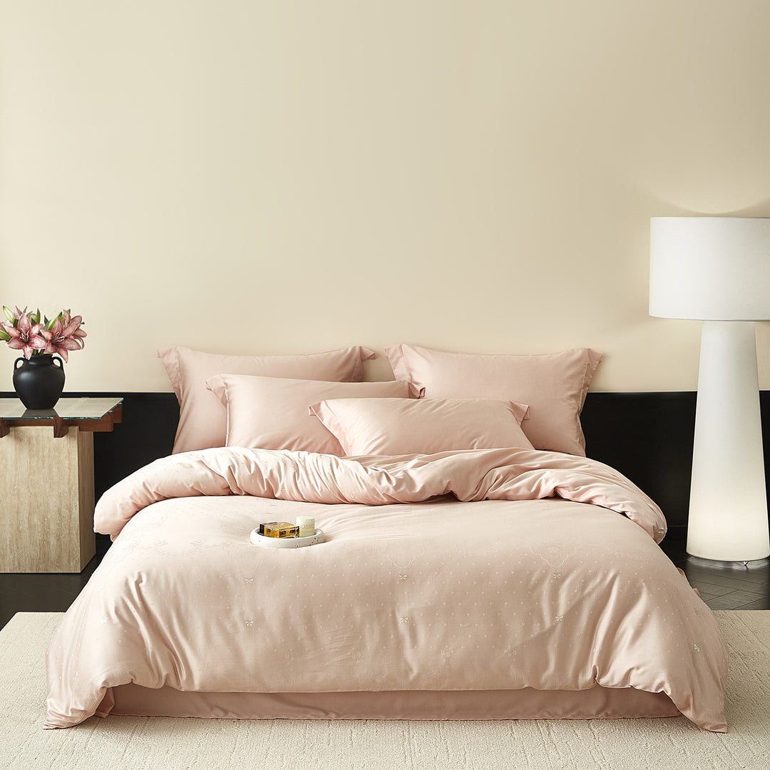 Satin bedding set with silky feel, hotel closure and tone-on-tone pattern