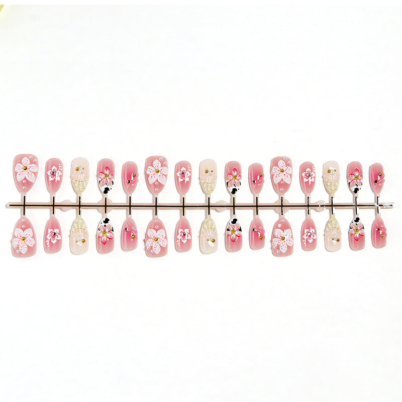Artificial nail set with elegant floral accents Stornfield