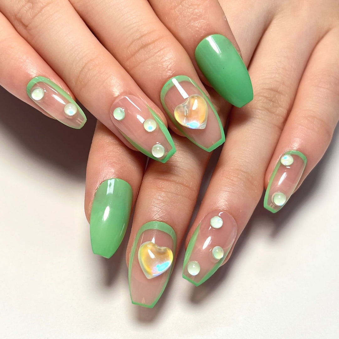 Creative Nail Art with Glitter and Heart Decorations Stornfield