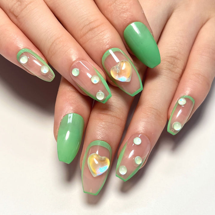 Creative Nail Art with Glitter and Heart Decorations Stornfield