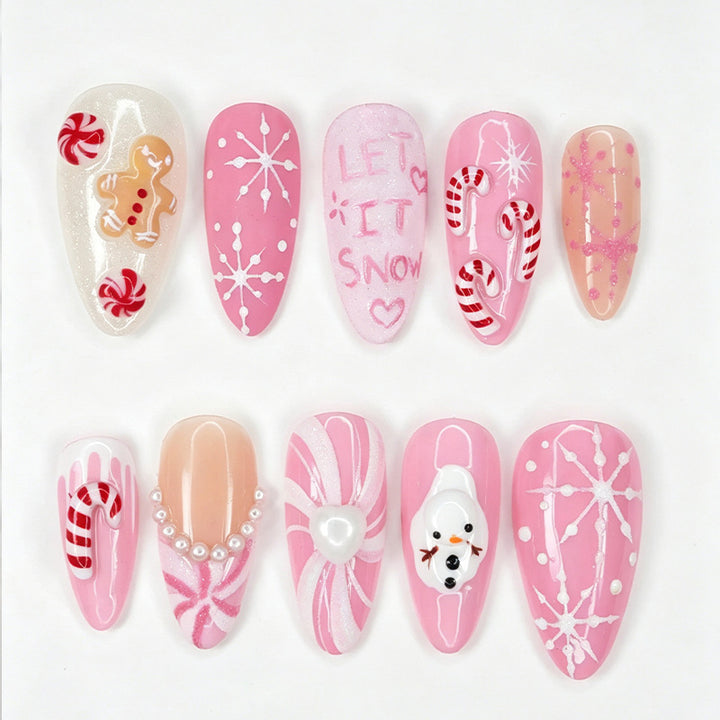 Acrylic nail set with festive Christmas designs and glamorous accents Stornfield