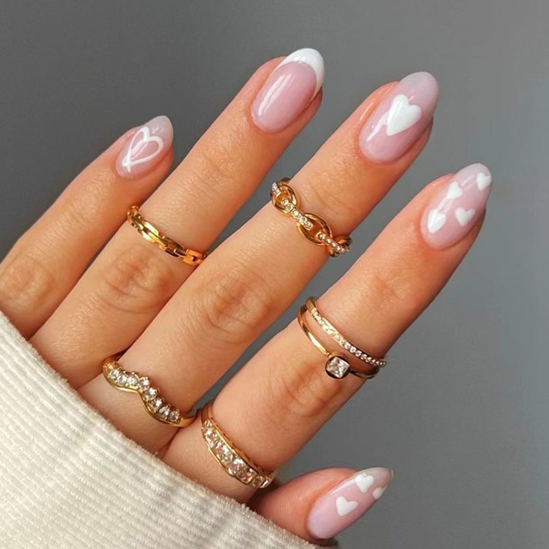 Elegant artificial nails with hearts and glitter Stornfield