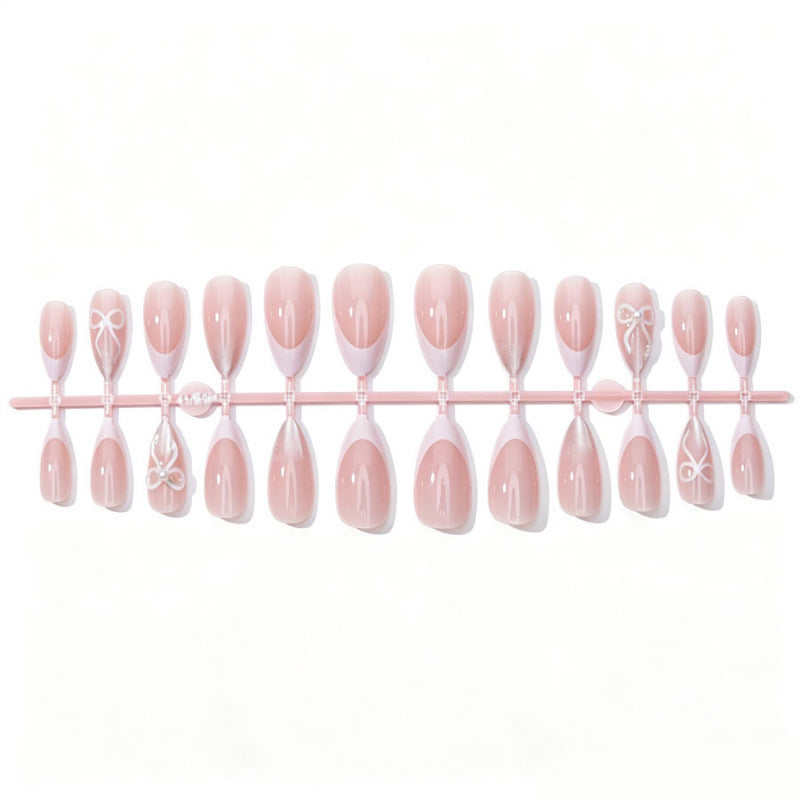 Elegant Press-On Nail Set with Bow and Glitter Accents