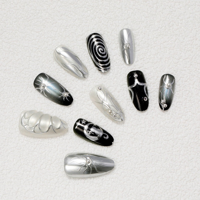 Artificial nails with metallic effects and complex designs Stornfield