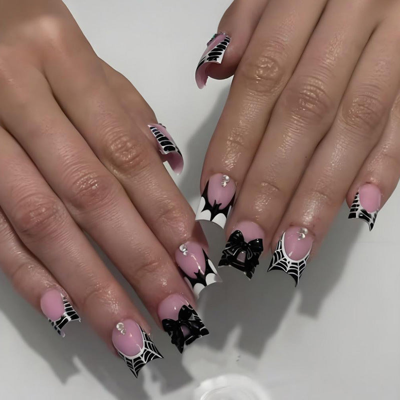 Artificial nail set with spooky clown motifs and extravagant accents Stornfield