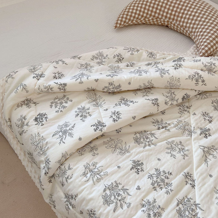 Cozy baby quilt with minky fleece border and cute rabbit print