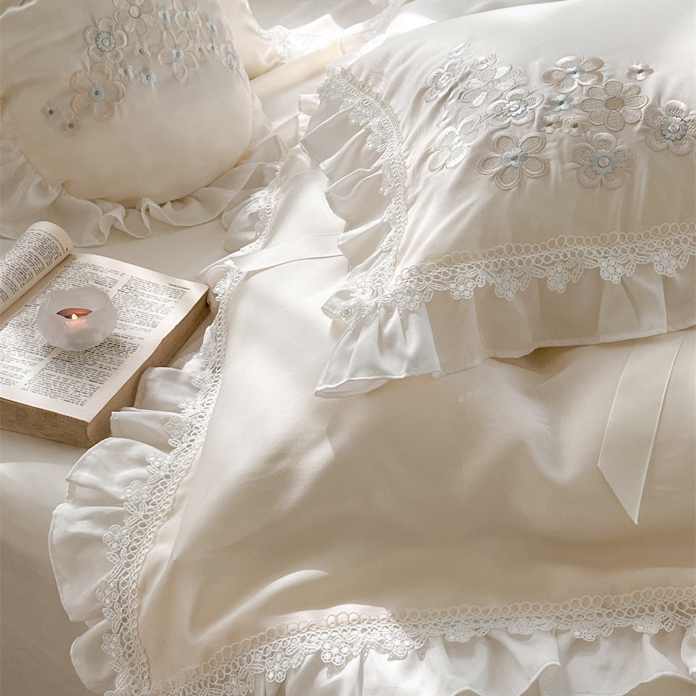 Victorian-inspired cotton satin bedding set with lace ruffles and bows