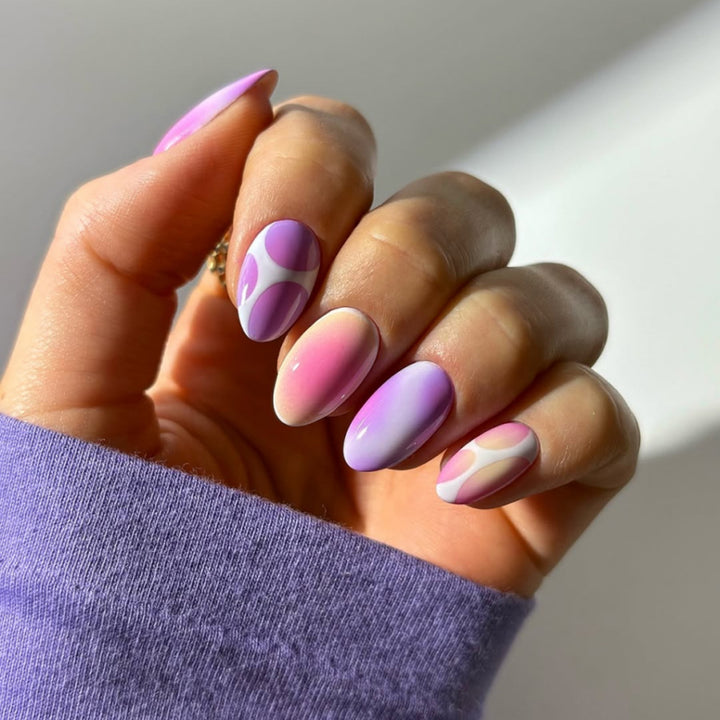 Elegant and creative nail art with a gentle gradient and geometric accents Stornfield