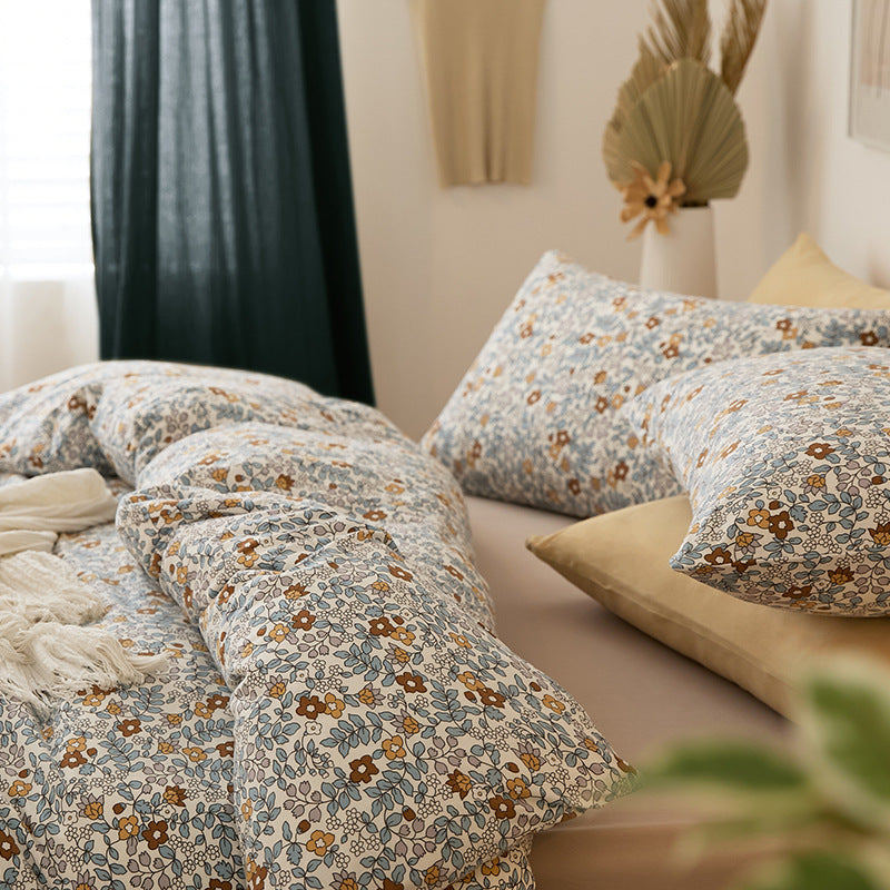 Bedding set with quilted light down filling, cotton blend and fine millefleurs print