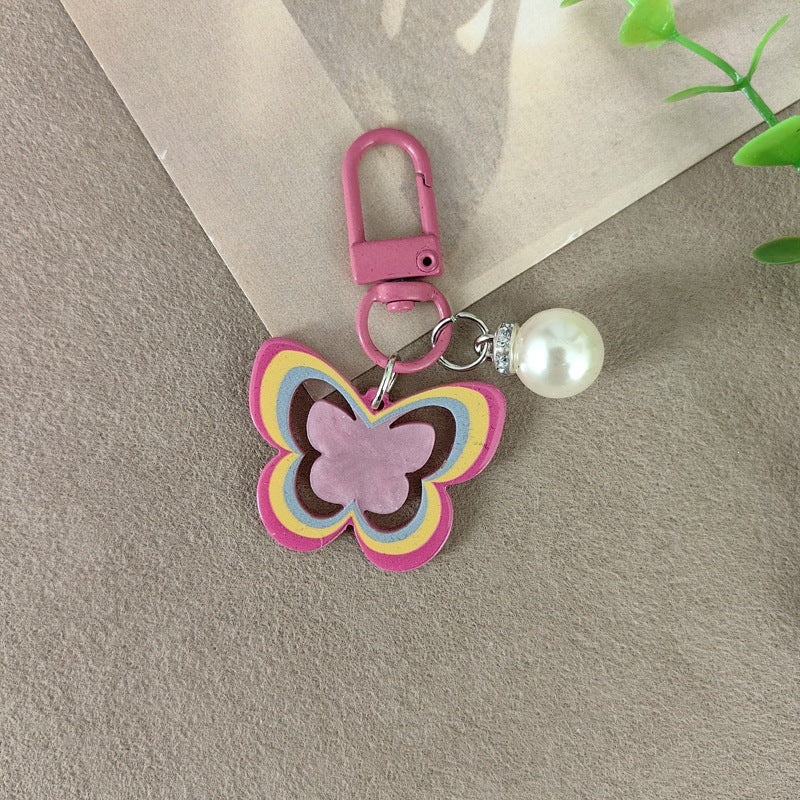 Keychain with butterfly and pearl accent Stornfield