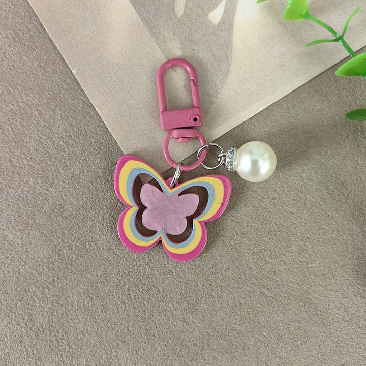Keychain with butterfly and pearl accent Stornfield